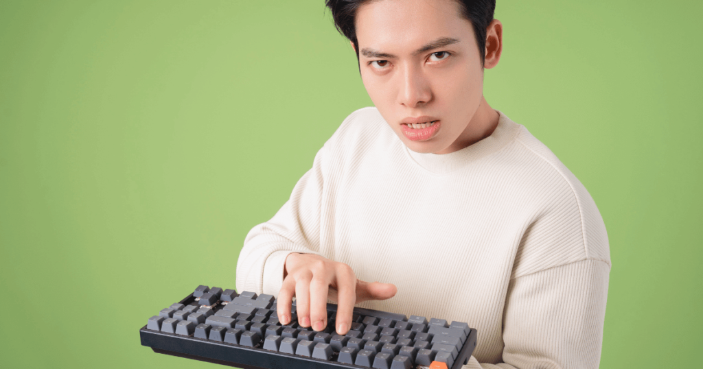 Man holding keyboard