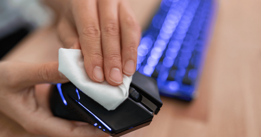 Cleaning top surface of a wireless gaming mouse